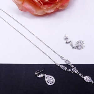 Vintage signed Givenchy silver tone crystal necklace pierced earrings set
