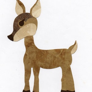 May include: A brown paper cutout of a deer with large ears and a long tail. The deer is standing on a white background.
