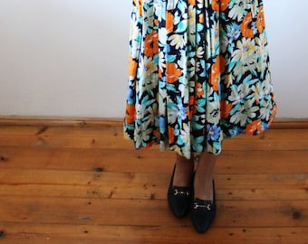 Falda de flores Estampado de flores plisadas boho Estampado de colores azul naranja falda negra años 70 (S/M)