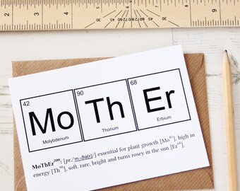 May include: A white card with a periodic table design featuring the elements Molybdenum, Thorium, and Erbium. The elements are arranged to spell out the word "Mother". The card includes a definition of the word "Mother" using the chemical symbols and names of the elements.