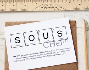 May include: A white card with the word "SOUS" spelled out using chemical element boxes. The boxes are labelled with the element's name and atomic number. The text below the boxes defines the word "SOUS" as a chemical element.