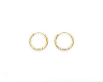 Ladies 10k White Gold Polished Endless Hollow Tube Hoop Earrings 20mm x 1.2mm Ladies 10k White Gold Polished Endless Hollow Tube Hoop Earrings 20mm x 1.2mm
