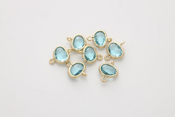 Framed glass connector, N6-P11, 2 pcs, 9x11mm, Oval Nugget connector, Aquamarin, Cutting glass, Gold plated brass, FS01-11