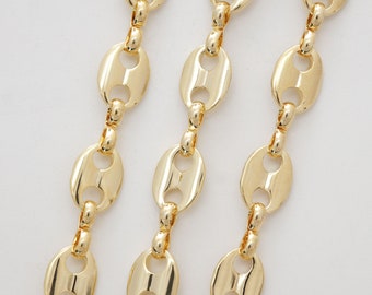 May include: Three gold chains with oval links. The chains are arranged in a row, with the top chain being the longest and the bottom chain being the shortest.