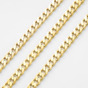 May include: Three gold chains with a curb link pattern. The chains are laid out in parallel lines on a white background.