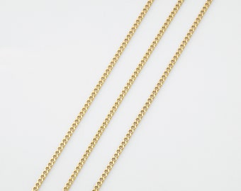 May include: Three gold chains of different lengths, all with a curb link style.