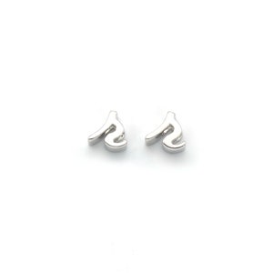May include: A pair of silver earrings with a stylized letter 'S' design.