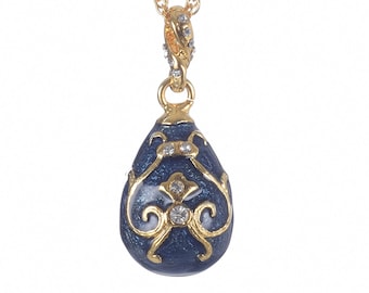 Collar con colgante de huevo azul: oro de 24 quilates, cristales de Swarovski, diseño de Keren Kopal