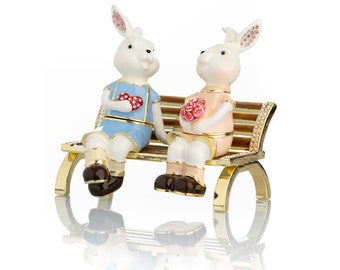 2 bunnies in love sitting on a bench, valentine flowers and chocolates Trinket Box