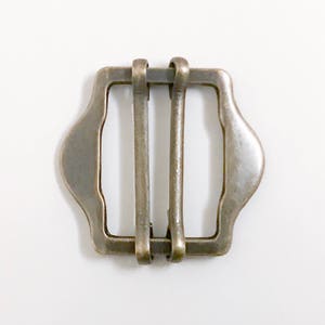20 pcs of metal vest buckles 25mm x 18mm (antique brass finish)