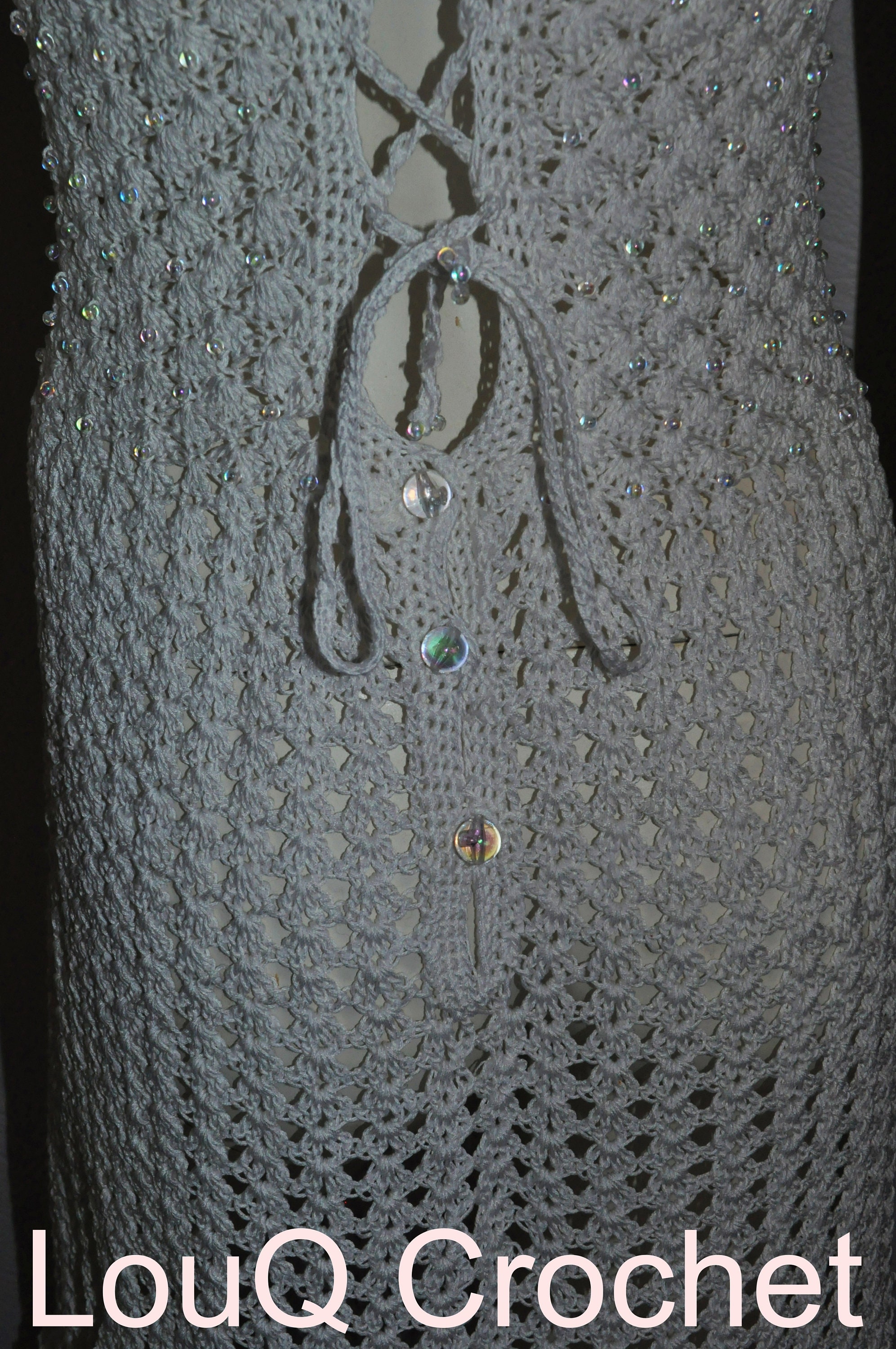 Crocheted beaded White lace up dress.