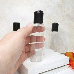 2 oz squeeze bottle, set of 3 clear plastic bottles with Black OR White bottle cap travel bottles for shampoo lotion and soap dispenser