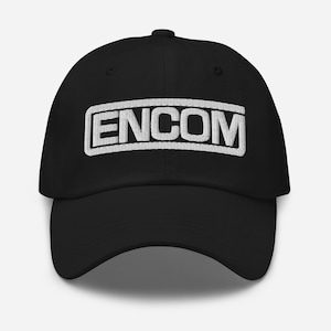 May include: Black baseball cap with a white embroidered logo that says "ENCOM".