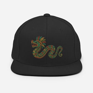 May include: Black baseball cap featuring a colorful embroidered serpent design. The serpent is depicted in green, red, and yellow, with intricate patterns and a feathered headdress. The cap has a flat brim and a structured fit.