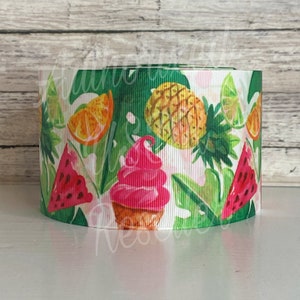 May include: White ribbon with a colorful tropical fruit and ice cream print. The ribbon features watermelon, pineapple, orange, lime, and ice cream cones.