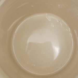 May include: White ceramic mug with a smooth, glossy interior. The mug is empty and appears to be new.