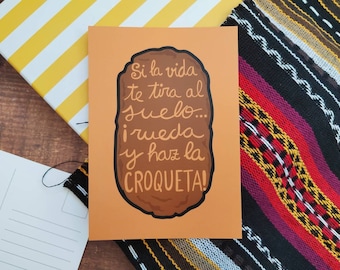 Croqueta food postcard with motivational Spanish life quote. Funny Spanish quote card for a Spanish student or teacher.