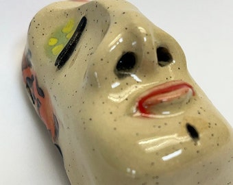 Ceramic wall hanging face