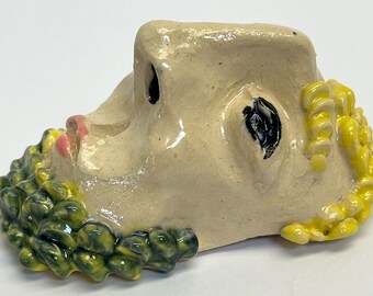 Ceramic wall hanging face