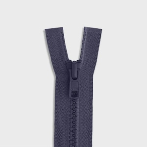 May include: A navy blue zipper with a closed slider. The zipper teeth are interlocked, and the fabric tape extends upwards. The zipper is a common component in clothing and accessories.