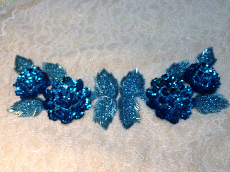 Turquoise beaded and sequined applique pair 237