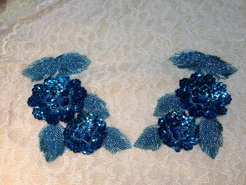 Turquoise beaded and sequined applique pair 237
