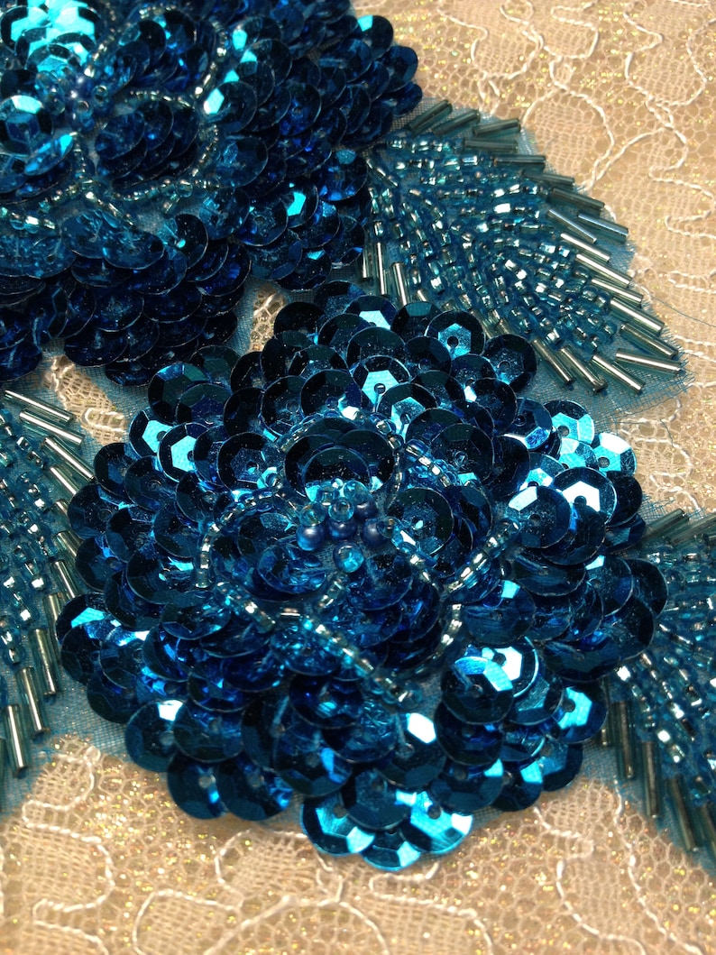 Turquoise beaded and sequined applique pair 237