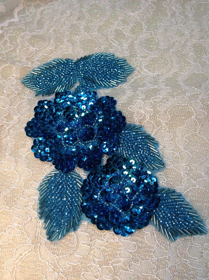 Turquoise beaded and sequined applique pair 237