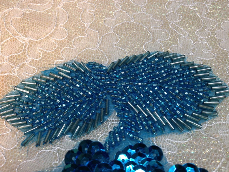 Turquoise beaded and sequined applique pair 237