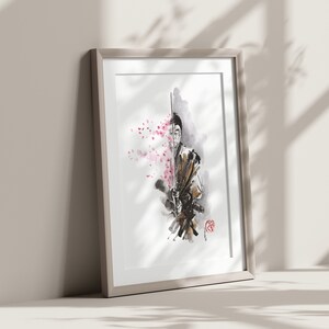 May include: Framed artwork featuring a watercolor illustration of a samurai holding a sword. The artwork is in shades of black, brown, and white, with pink cherry blossoms on the left side. The frame is a light beige color.