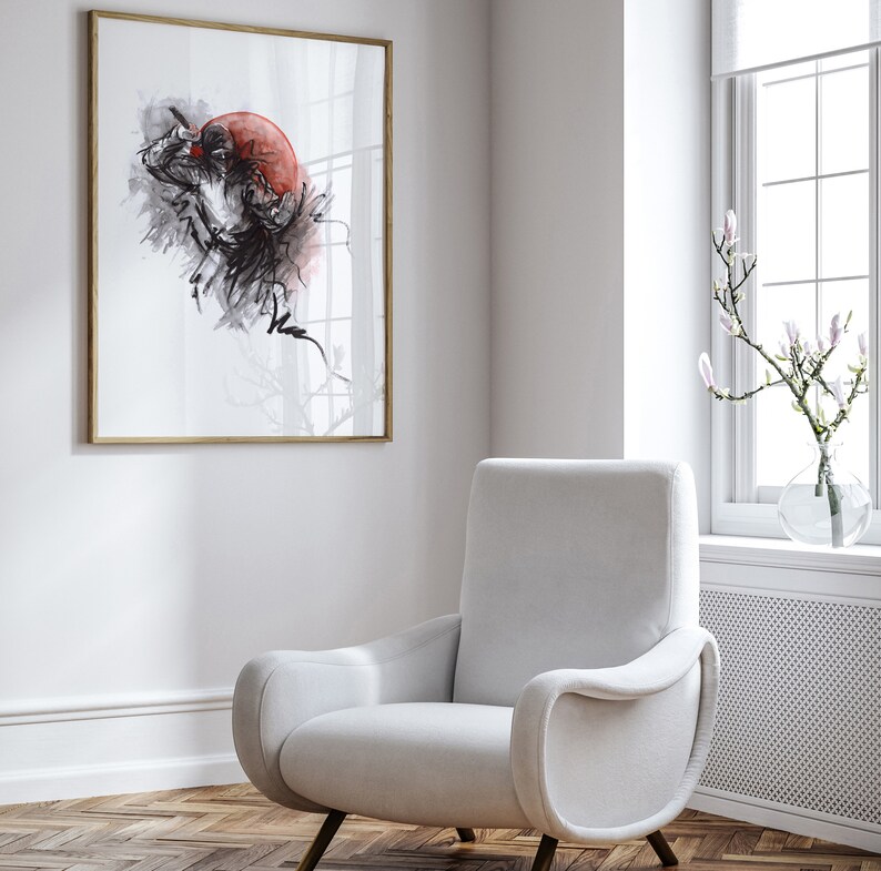 May include: A framed black and white ink drawing of a person in a red circle. The drawing is on a white background and is framed in a light wood frame.