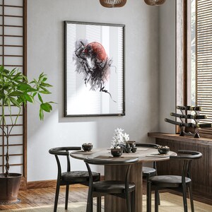 May include: A black framed print of a red and black ink drawing of a person in a red hooded robe. The print is hanging on a white wall above a wooden table with four black chairs. There are black and white flowers in a vase on the table.