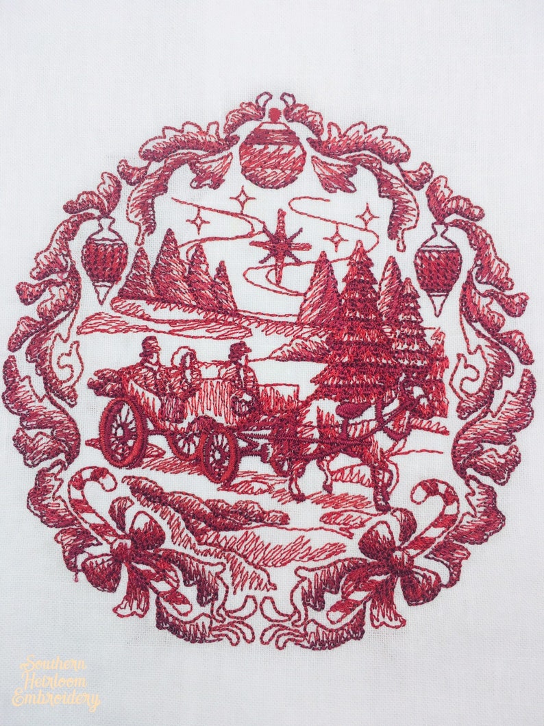 May include: Red embroidered design of a horse-drawn carriage with a couple inside, traveling through a snowy winter scene with pine trees and a star in the sky. The design is surrounded by a decorative border with ornaments and candy canes.