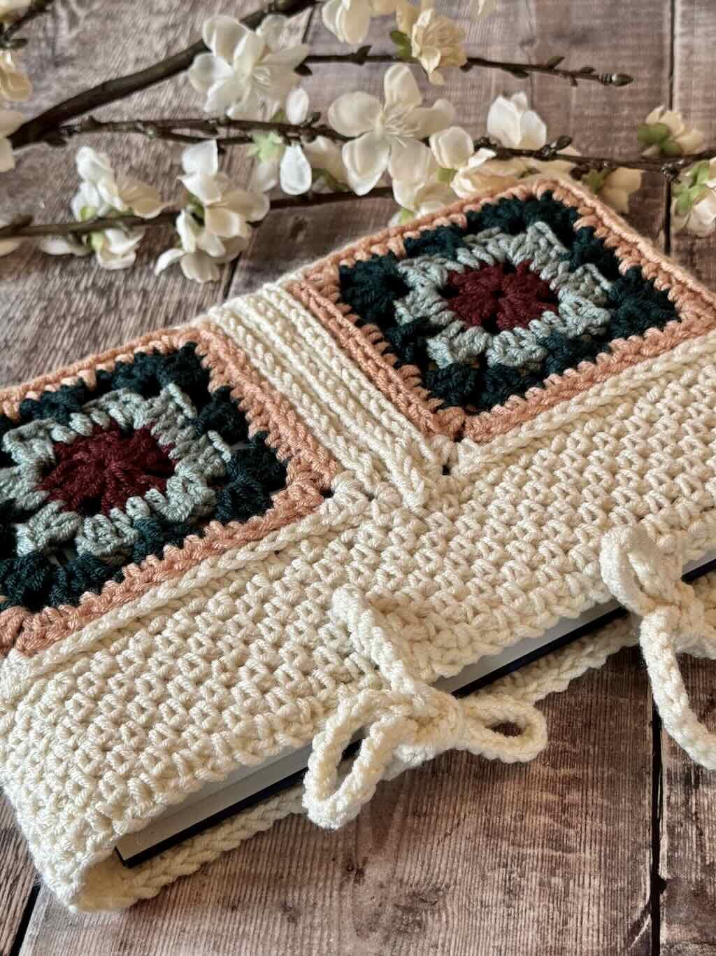 30 Book Sleeve Crochet Patterns for Stylish, Protective Handmade Reading Accessories 26 The Hearthside Granny Square Book Sleeve Crochet Pattern