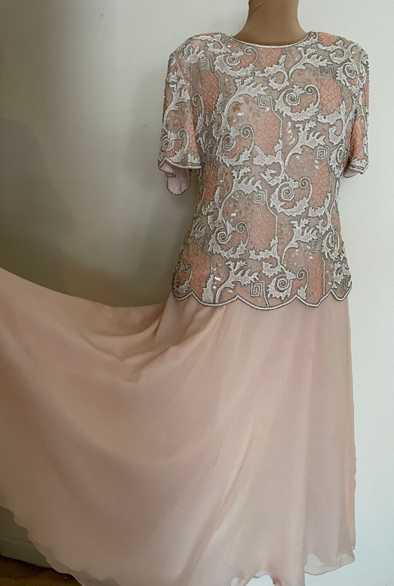 Enchanting Feathered Trumpet Gown for Unforgettable Evenings