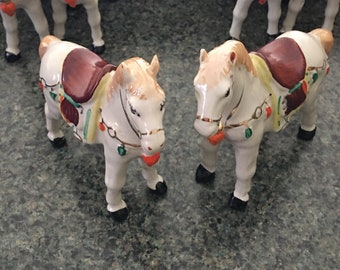 Pair of Parade Horses, White Ceramic Painted Ponies Adorned with Gold Paint and Painted Peppers
