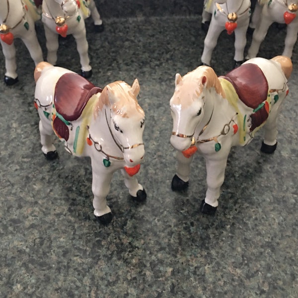 Pair of Parade Horses, White Ceramic Painted Ponies Adorned with Gold Paint and Painted Peppers