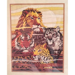 May include: A white ceramic mug with a black handle and the text "But first, coffee" in a handwritten style. The mug is on a white surface. The mug is approximately 4 inches tall.