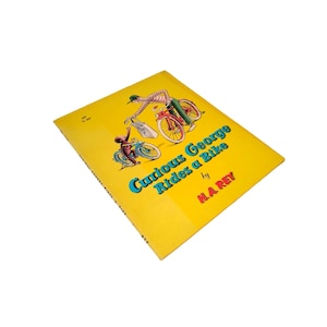 Curious George Rides a Bike 1962 1st Scholastic Paperback Printing by H.A. Rey