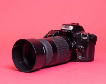Minolta Maxxum 300si 35mm SLR Film Camera w/ 90-300mm Telephoto Zoom Lens