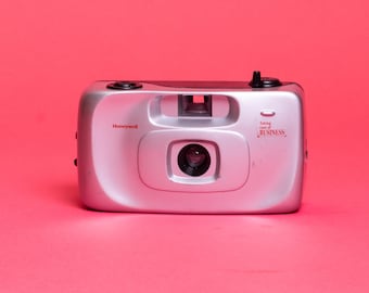 Zakendoen "Toy" 35-mm-filmcamera: richten en fotograferen