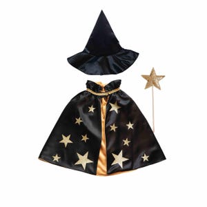 a black wizard's outfit with gold stars, including a black hat, cape, and a gold star prop.