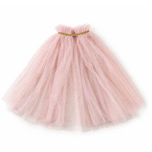 May include: A pale pink tulle cape featuring multiple layers of sheer, glitter-dusted fabric. The garment has a gathered, ruffled neckline accented with a thin, metallic gold trim that encircles the collar, creating a soft, voluminous silhouette.