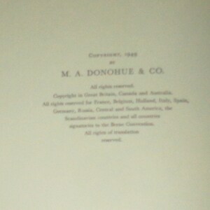 May include: Copyright page of a book published in 1948 by M.A. Donohue & Co. The text states that all rights are reserved and lists countries where the copyright applies.