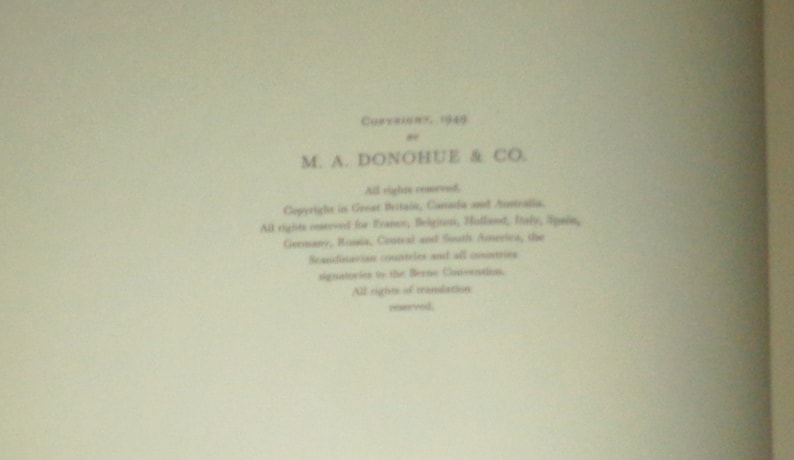 May include: Copyright page of a book published in 1948 by M.A. Donohue & Co. The text states that all rights are reserved and lists countries where the copyright applies.