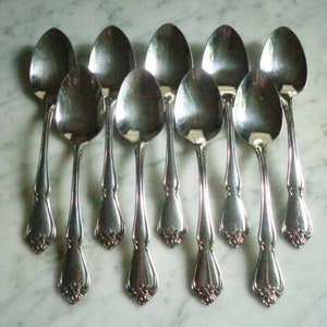 True Rose 1881 Rogers Stainless Oneida Ltd 6 7/8 inch set of 9 Table Soup Spoons