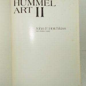 May include: Book cover with the title "Hummel Art II" by John F. Hotchkiss with Christine Cassidy.