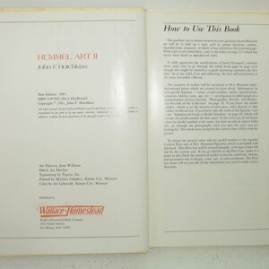 May include: A book titled "Hummel Art II" by John F. Hotchkiss. The book cover features a white background with black text and a red title. The book is about the art of the German painter, Sister Maria Innocentia Hummel.