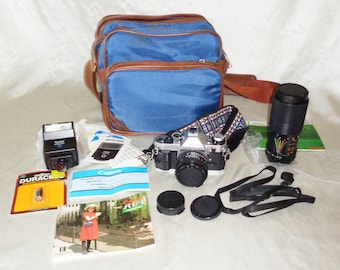 1981 Canon AE-1 Program 35mm Camera in Bag with Booklets & Accessories
