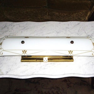 May include: A set of three ceramic nesting bowls in shades of blue, green, and white. The bowls feature a speckled glaze and a simple, modern design. The largest bowl is approximately 6 inches in diameter.